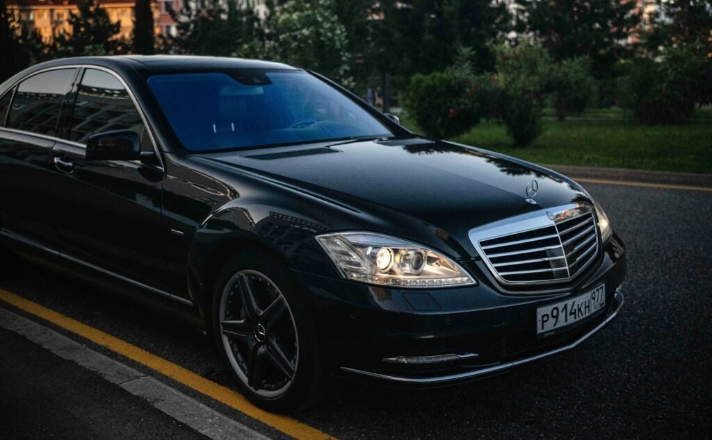 Black executive sedan for airport and business transfers